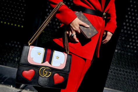 what's more expensive gucci or louis vuitton